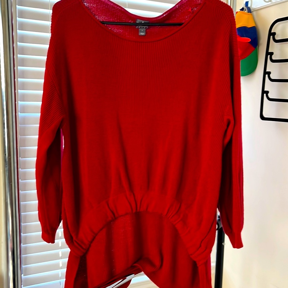 Cherry red sweater.